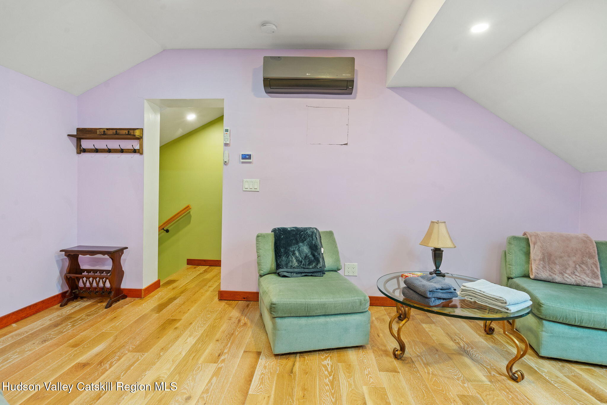 35 Scribner Hollow Road, Unit E3 Hunter, NY 12442 - Photo 39 of 59 a bedroom with a bed and a couch