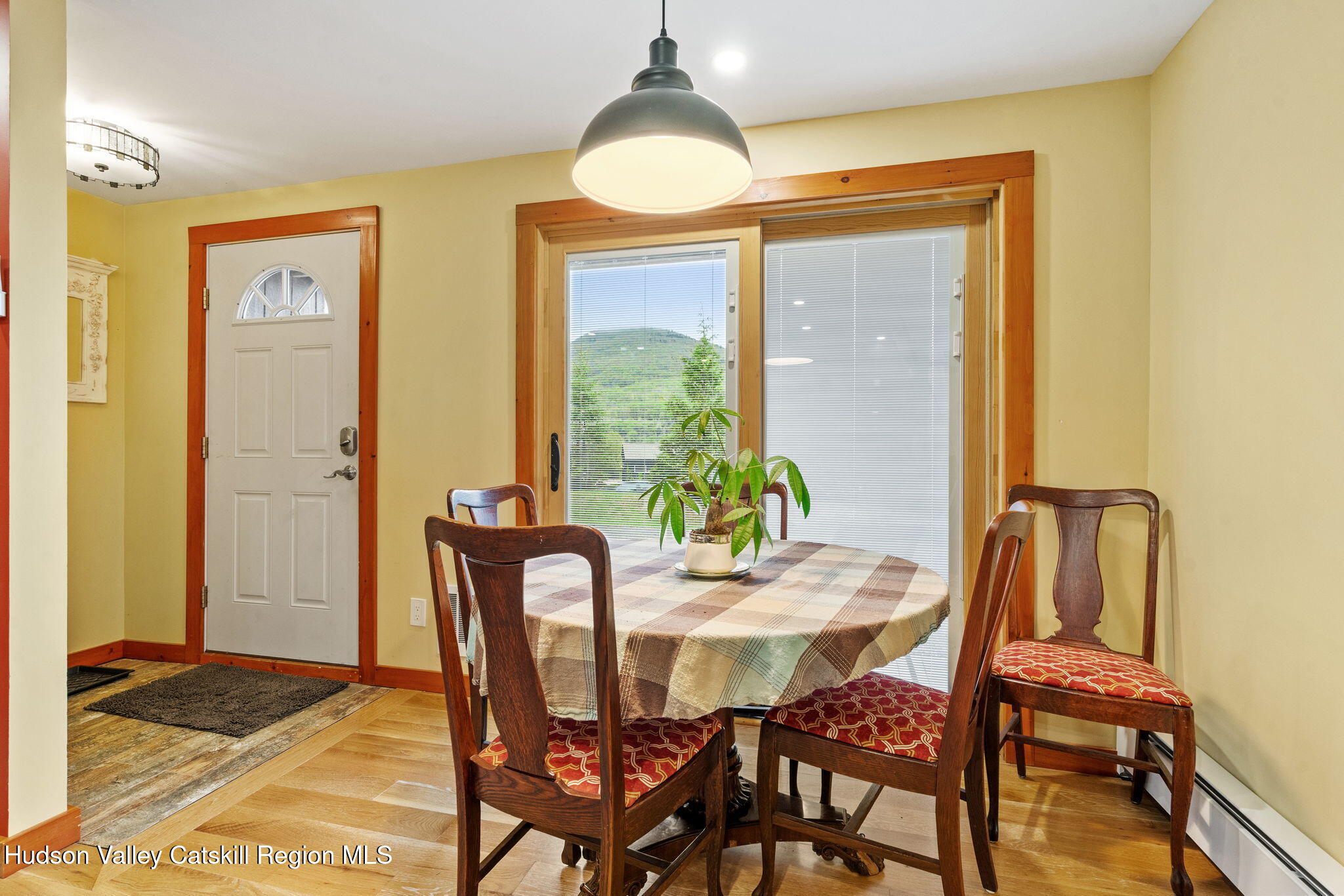 35 Scribner Hollow Road, Unit E3 Hunter, NY 12442 - Photo 46 of 59 a view of a dining room with furniture window and outside view