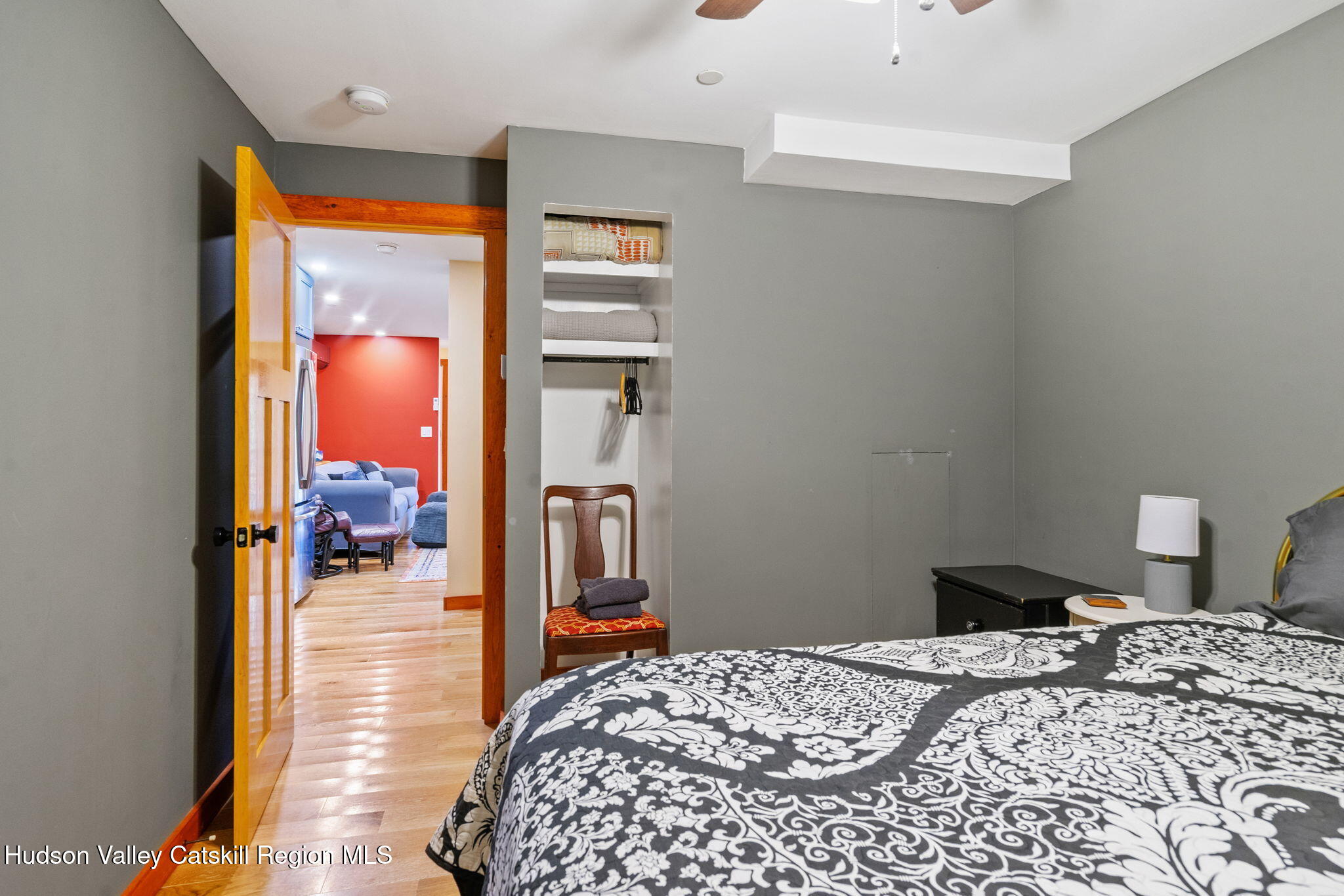 35 Scribner Hollow Road, Unit E3 Hunter, NY 12442 - Photo 54 of 59 a bedroom with a bed and wooden floor