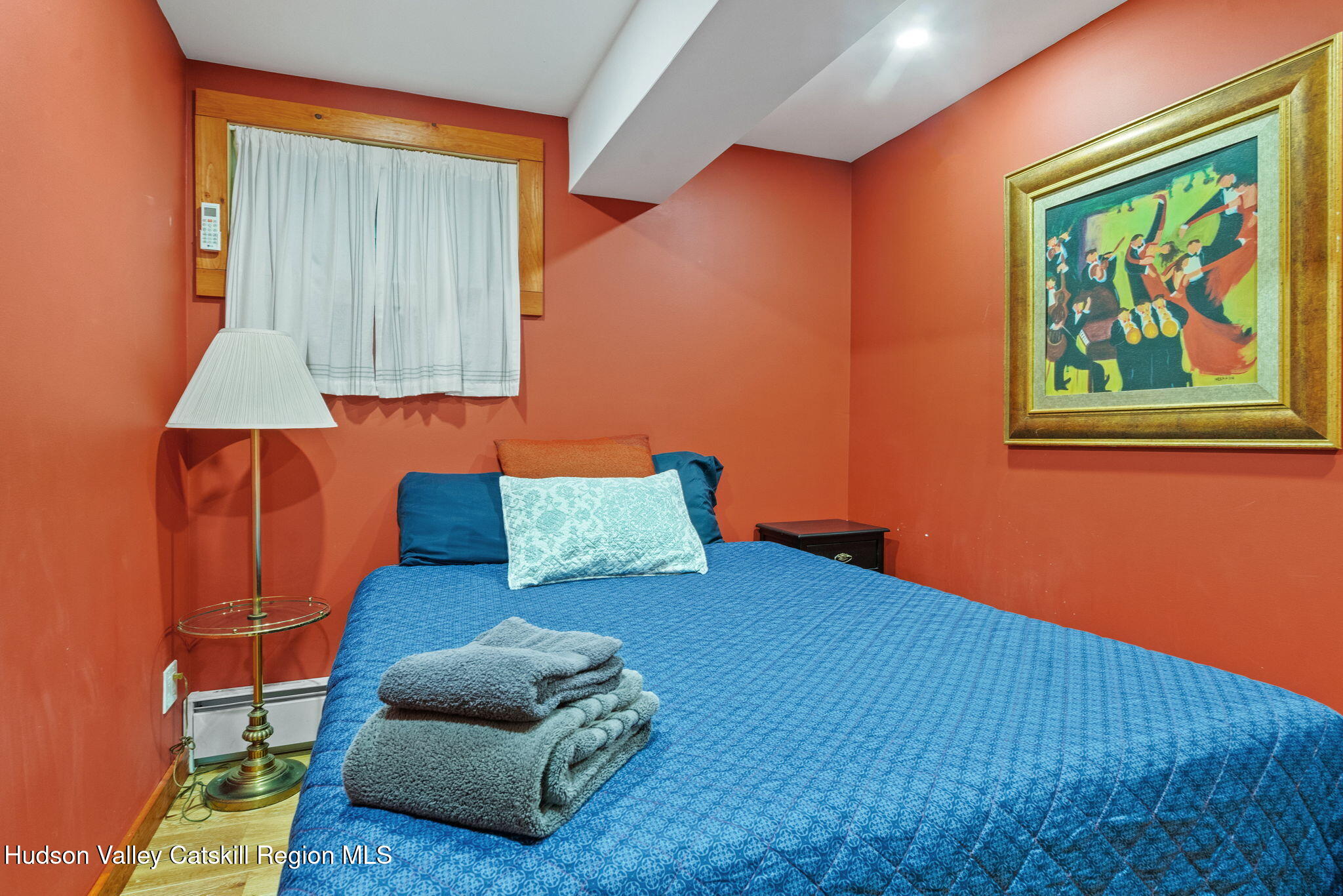35 Scribner Hollow Road, Unit E3 Hunter, NY 12442 - Photo 55 of 59 a living room with furniture and a window
