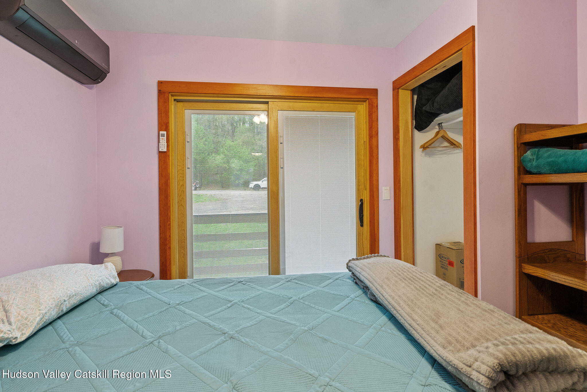 35 Scribner Hollow Road, Unit E3 Hunter, NY 12442 - Photo 8 of 59 a bedroom with a bed and a dresser