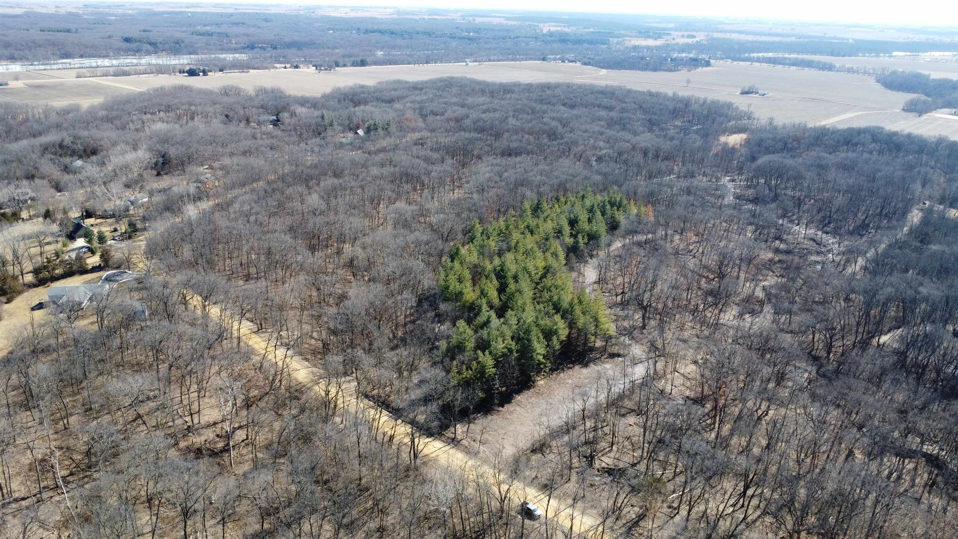 25 Ac /- West Penn Corner Road Oregon, IL 61061 - Photo 12 of 15 a view of a field with plants and trees