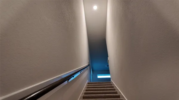 a view of a room with stairs