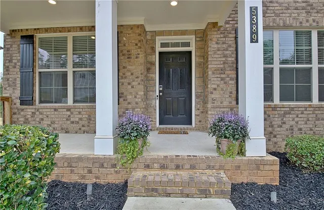 a front view of a house having yard