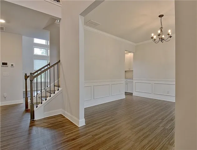a view of a livingroom with wooden floor