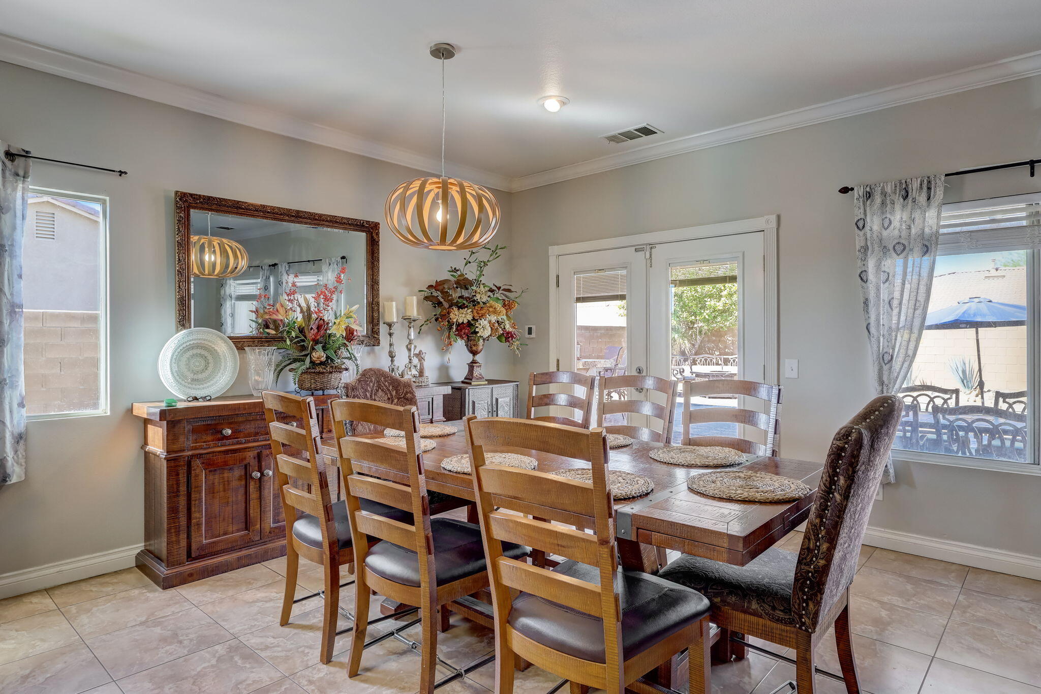 41163 Morris Street Indio, CA 92203 - Photo 18 of 83 a view of a dining room with furniture and window