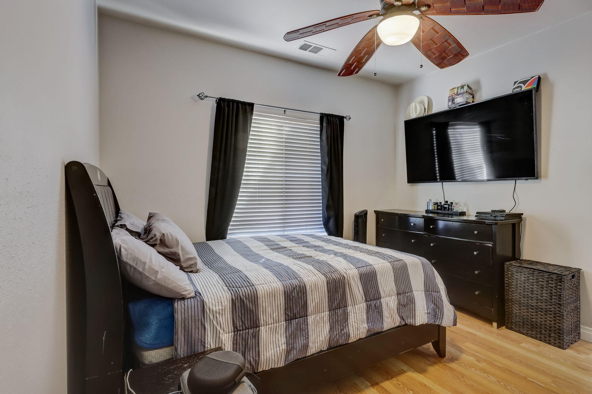 41163 Morris Street Indio, CA 92203 - Photo 28 of 83 a bedroom with a bed and a flat screen tv