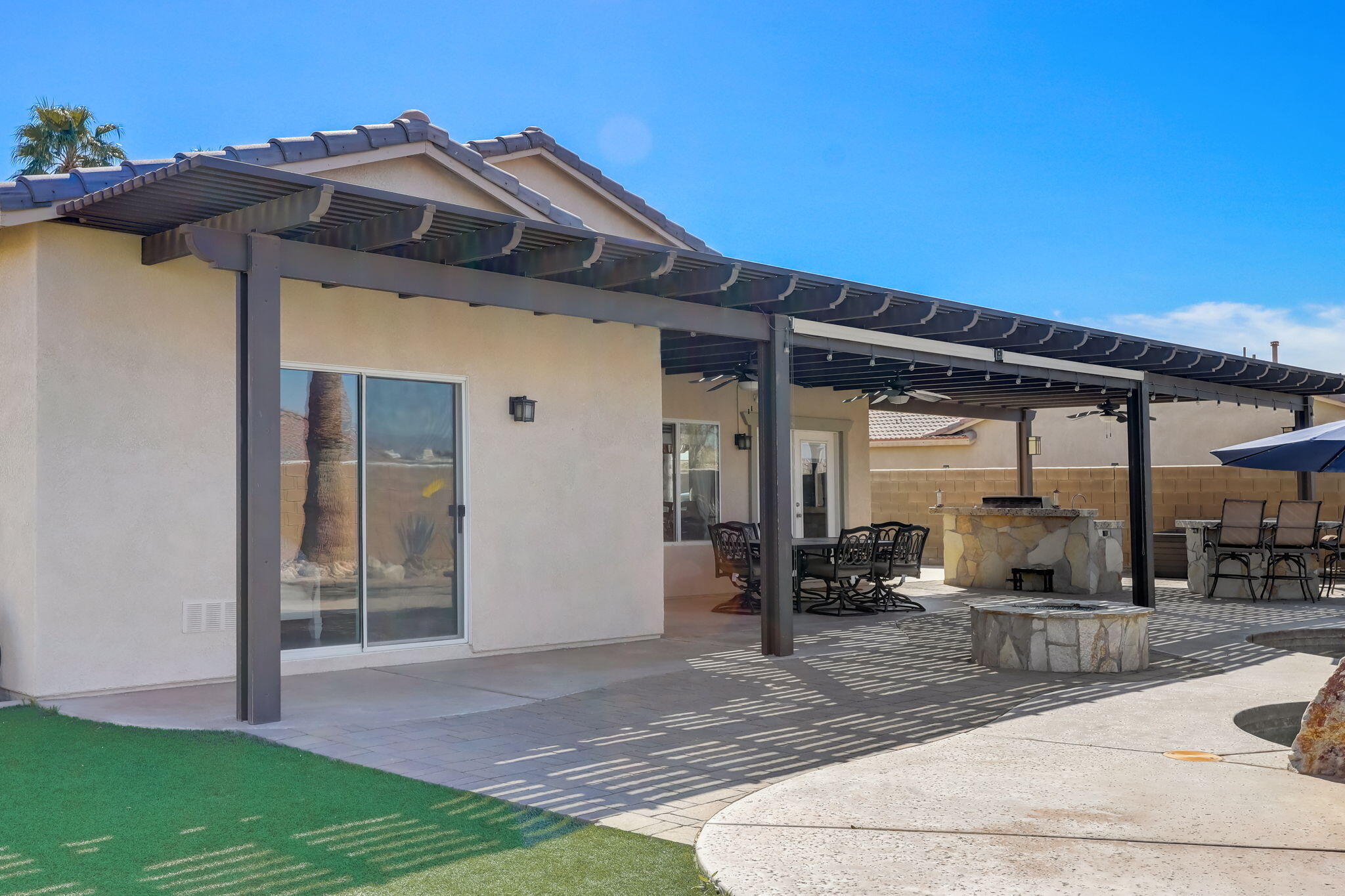 41163 Morris Street Indio, CA 92203 - Photo 48 of 83 a front view of a house with a porch
