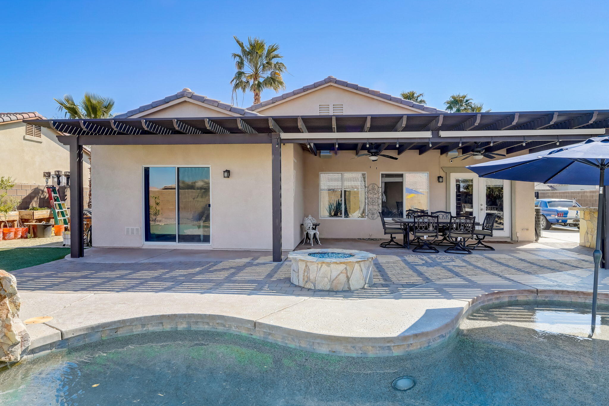 41163 Morris Street Indio, CA 92203 - Photo 50 of 83 a view of a house with entertaining space