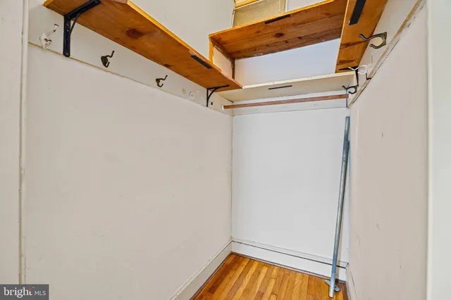 a view of a room with racks on the wall