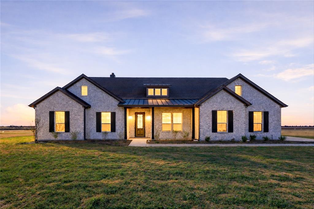 2020 County Road 200 Valley View, TX 76272 - Photo 1 of 1 a front view of a house with a garden