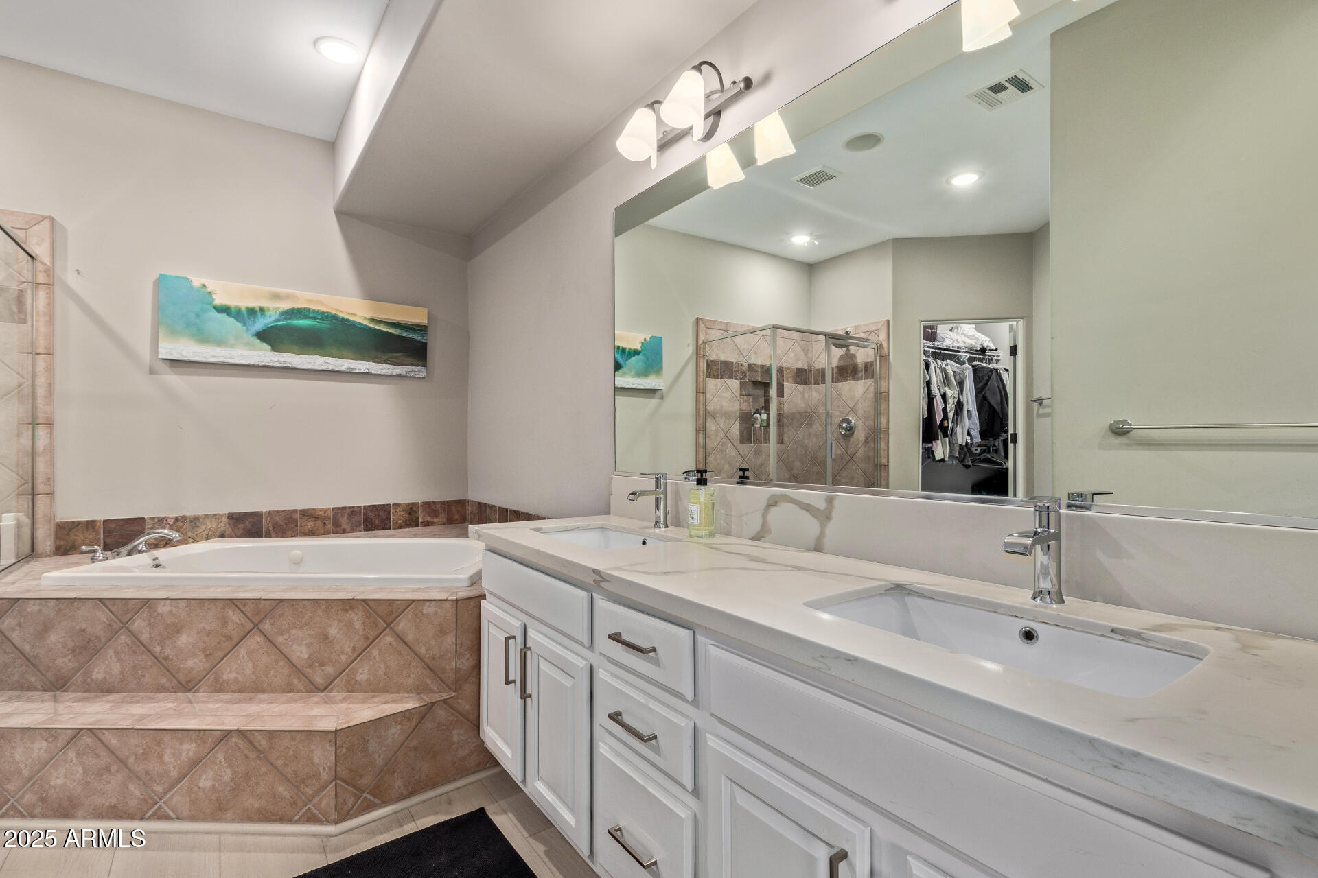 10011 North 1st Avenue Phoenix, AZ 85021 - Photo 13 of 23 a bathroom with a sink vanity and a mirror