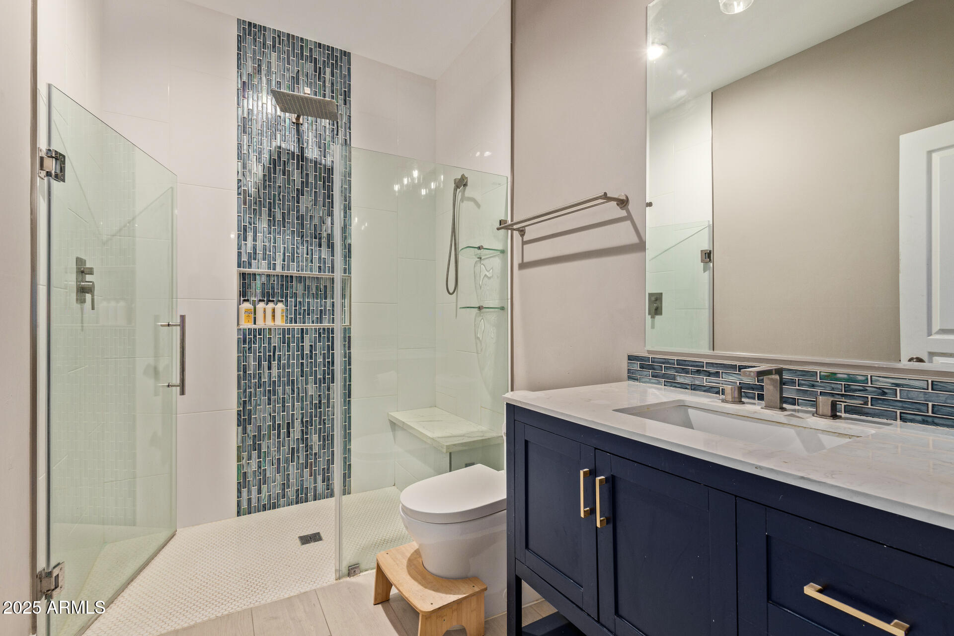 10011 North 1st Avenue Phoenix, AZ 85021 - Photo 19 of 23 a bathroom with a sink a toilet a mirror and shower