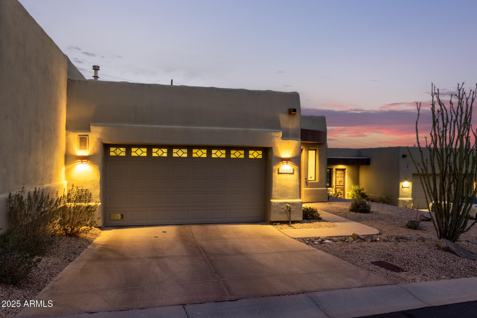 10011 North 1st Avenue Phoenix, AZ 85021 - Photo 2 of 23 a front view of a building with parking area