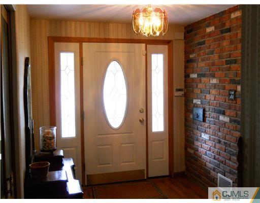 15 Hansen Road Old Bridge, NJ 08857 - Photo 8 of 22 a view of a entryway door with wooden floor