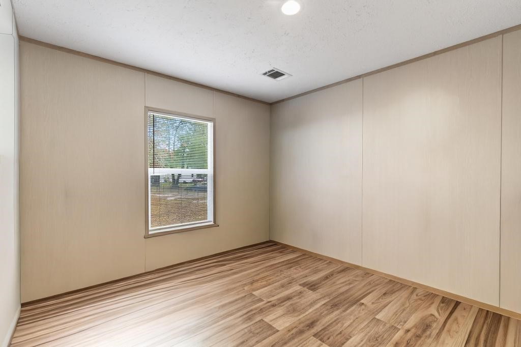 1088 Mulberry Landing Road Hilliard, FL 32046 - Photo 20 of 30 an empty room with windows