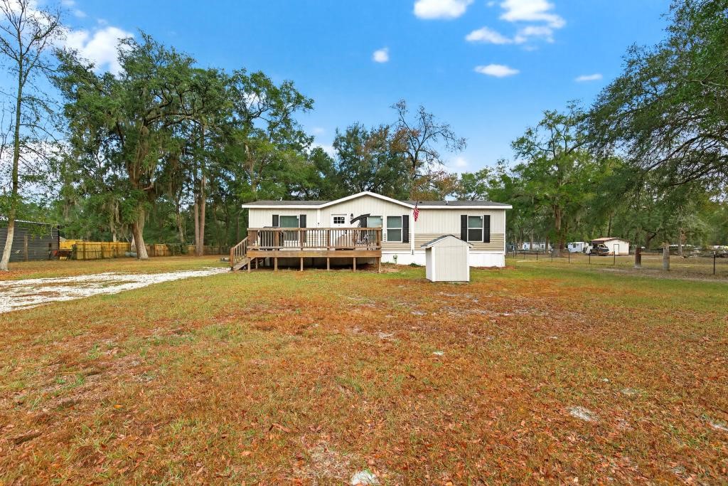 1088 Mulberry Landing Road Hilliard, FL 32046 - Photo 4 of 30 a house view with a garden space