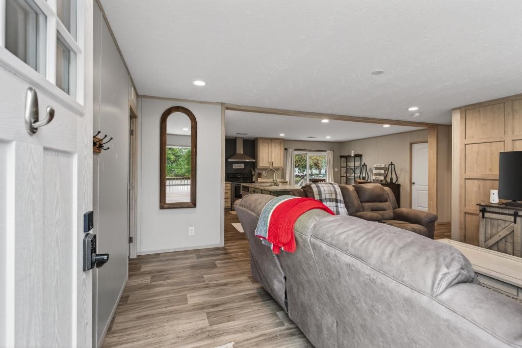 1088 Mulberry Landing Road Hilliard, FL 32046 - Photo 6 of 30 a bed room with a bed and a chair