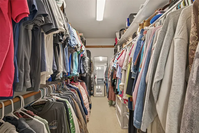 a view of backyard with outdoor seating and stairs
