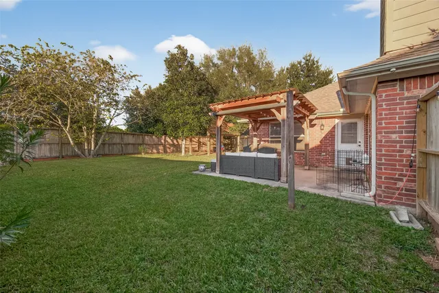 a view of a house with a big yard