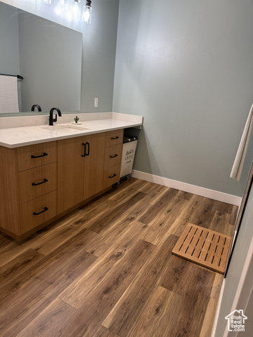 175 North 160 East Hurricane, UT 84737 - Photo 30 of 43 Bathroom featuring vanity and dark wood-style flooring