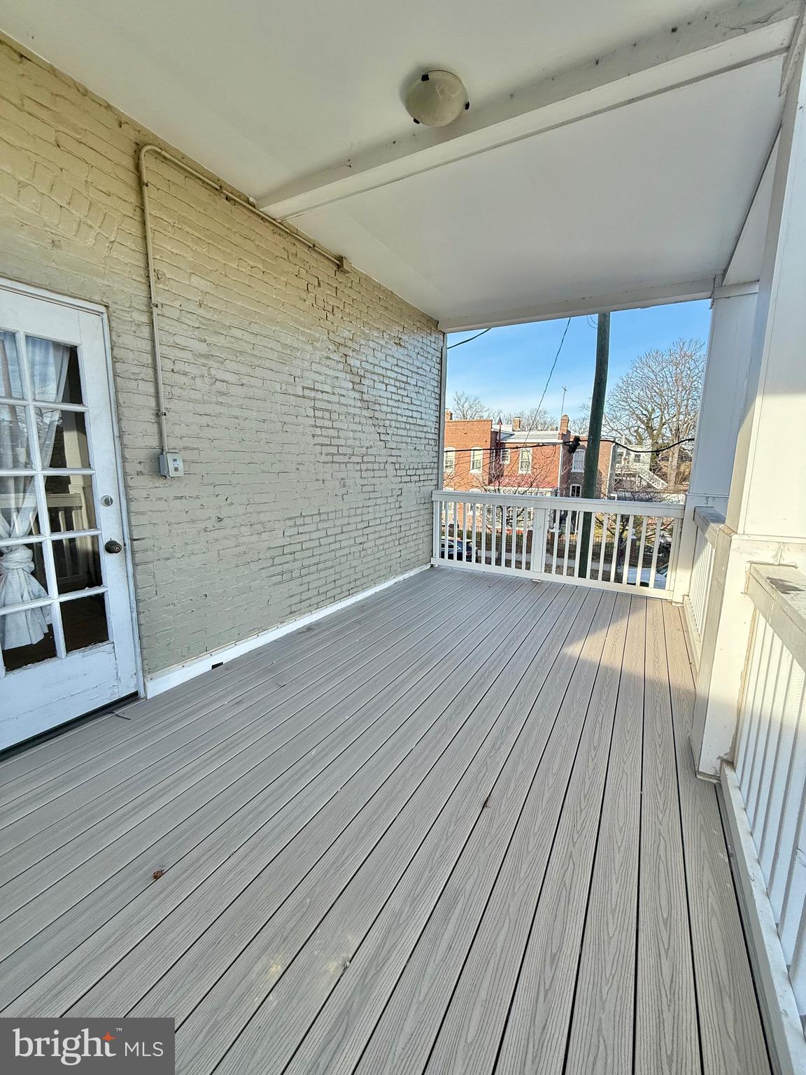 718 Oronoco Street, Unit 2 Alexandria, VA 22314 - Photo 16 of 27 a view of a room with wooden floor