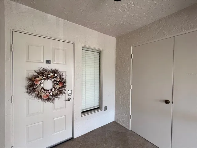 a view of a city with an ocean