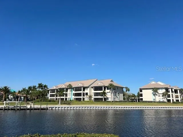 a front view of a building with lake view