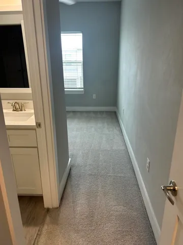 a view of a hallway to a house