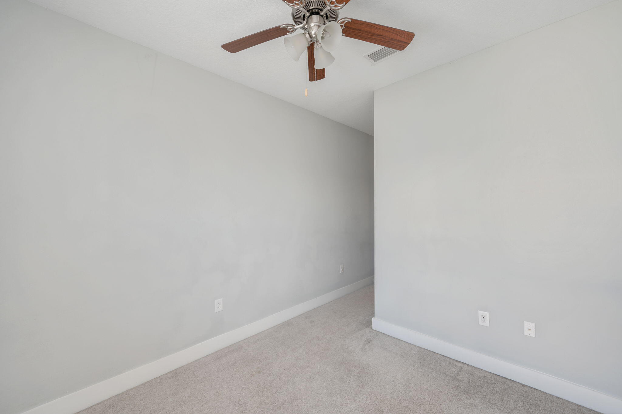 147 North Sand Palm Road Freeport, FL 32439 - Photo 28 of 39 a view of an empty room with a window