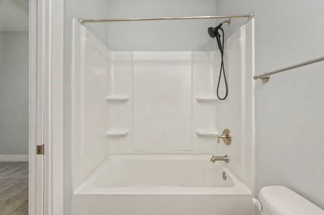 a bathroom with a sink vanity and a mirror