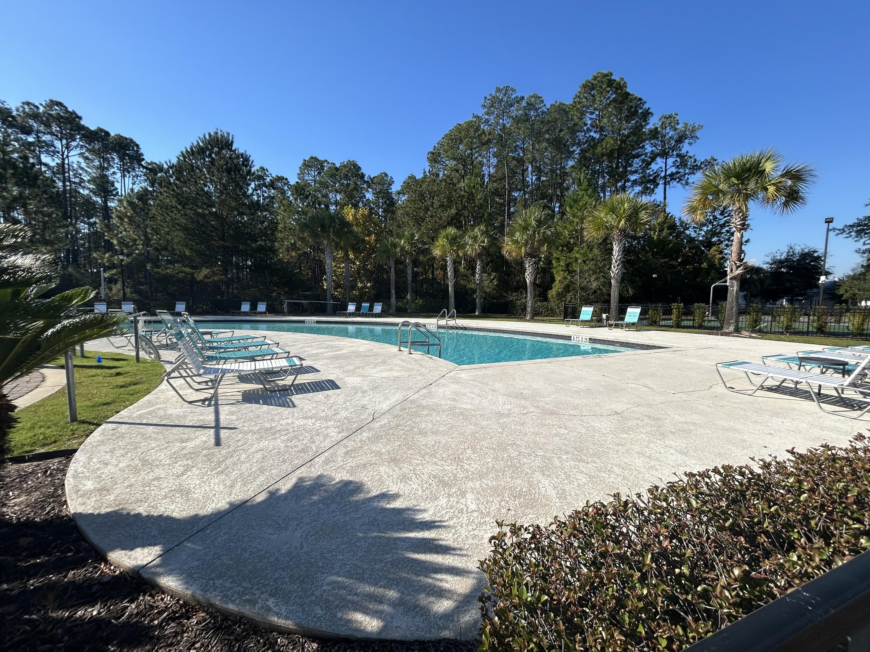 147 North Sand Palm Road Freeport, FL 32439 - Photo 37 of 39 a park view with a bench