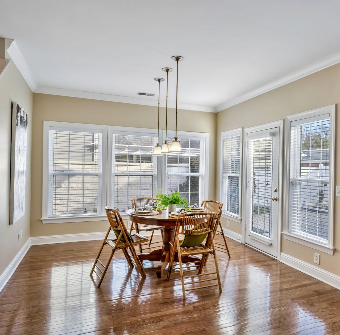 626 Springlake Drive Franklin, TN 37064 - Photo 13 of 22 a view of a dining room with furniture window and wooden floor