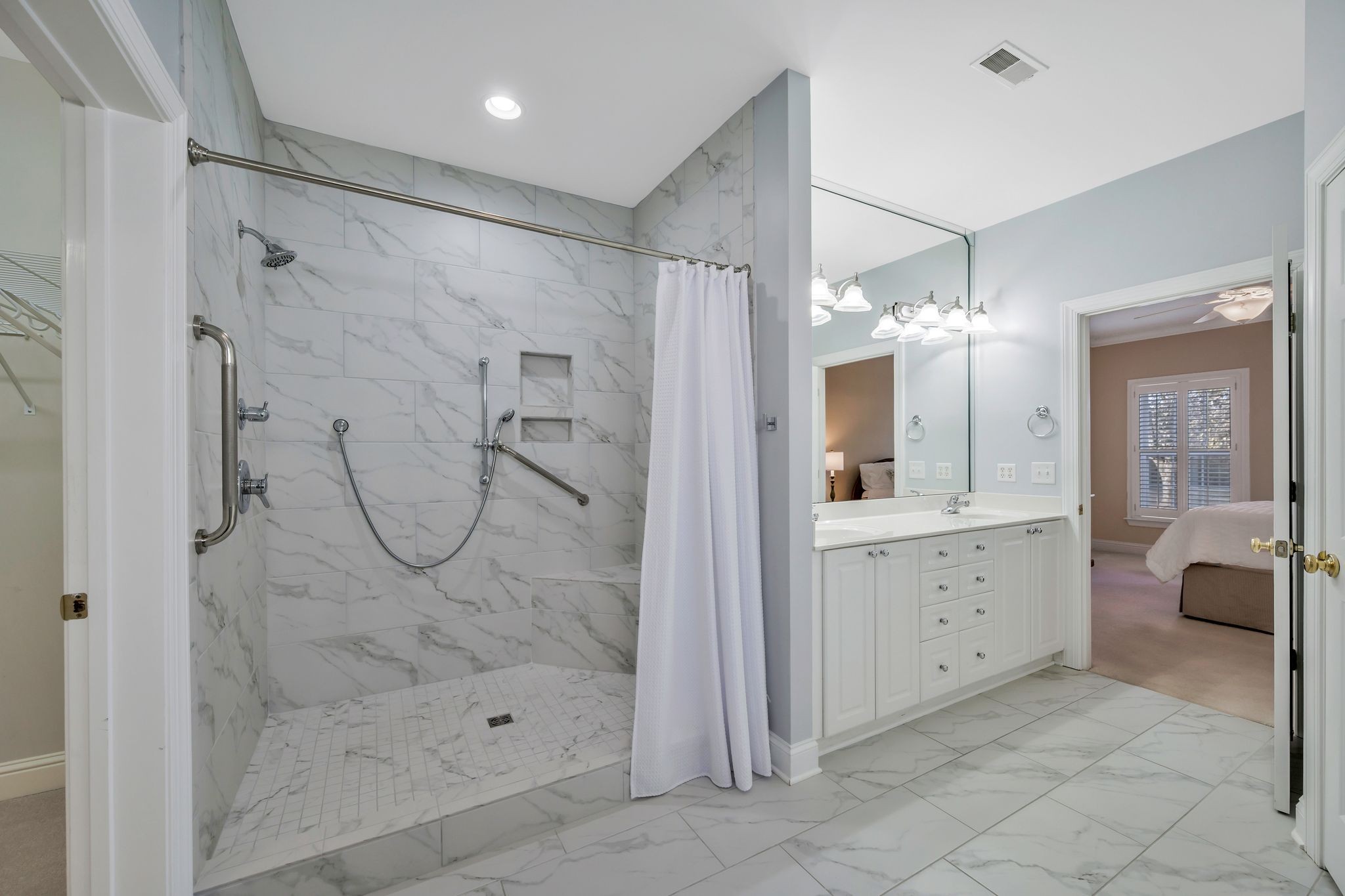 626 Springlake Drive Franklin, TN 37064 - Photo 16 of 22 a bathroom with a glass shower door and a sink