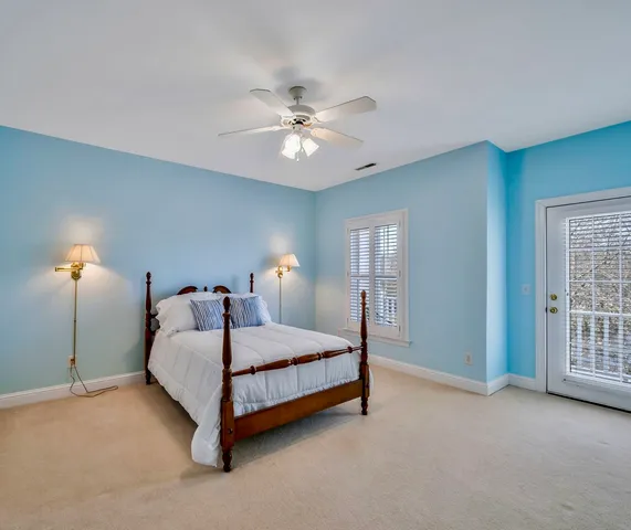 a view of a house with backyard sitting area and porch