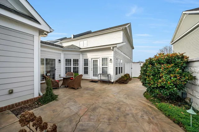 a view of a back yard of the house