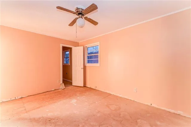 a kitchen with stainless steel appliances granite countertop wooden cabinets and a granite counter tops