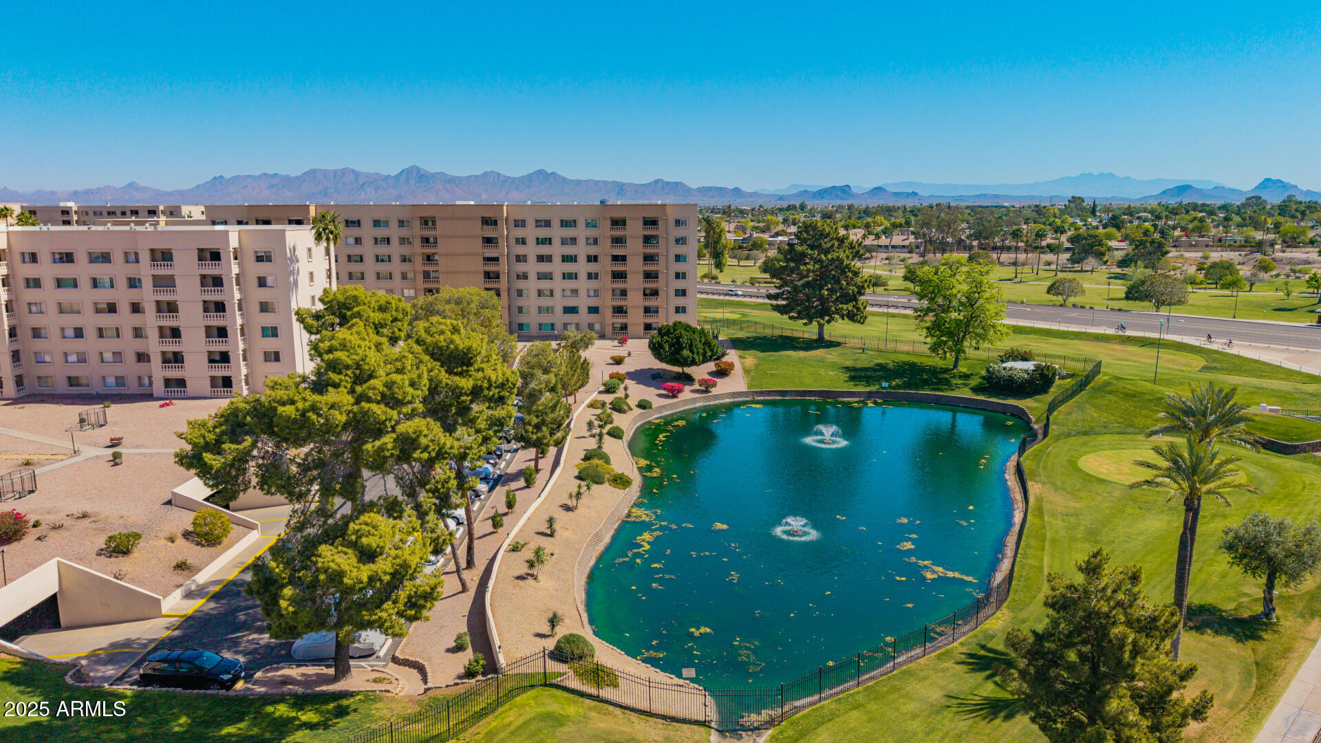 7910 East Camelback Road, Unit 104 Scottsdale, AZ 85251 - Photo 22 of 38 a view of a swimming pool and outdoor space