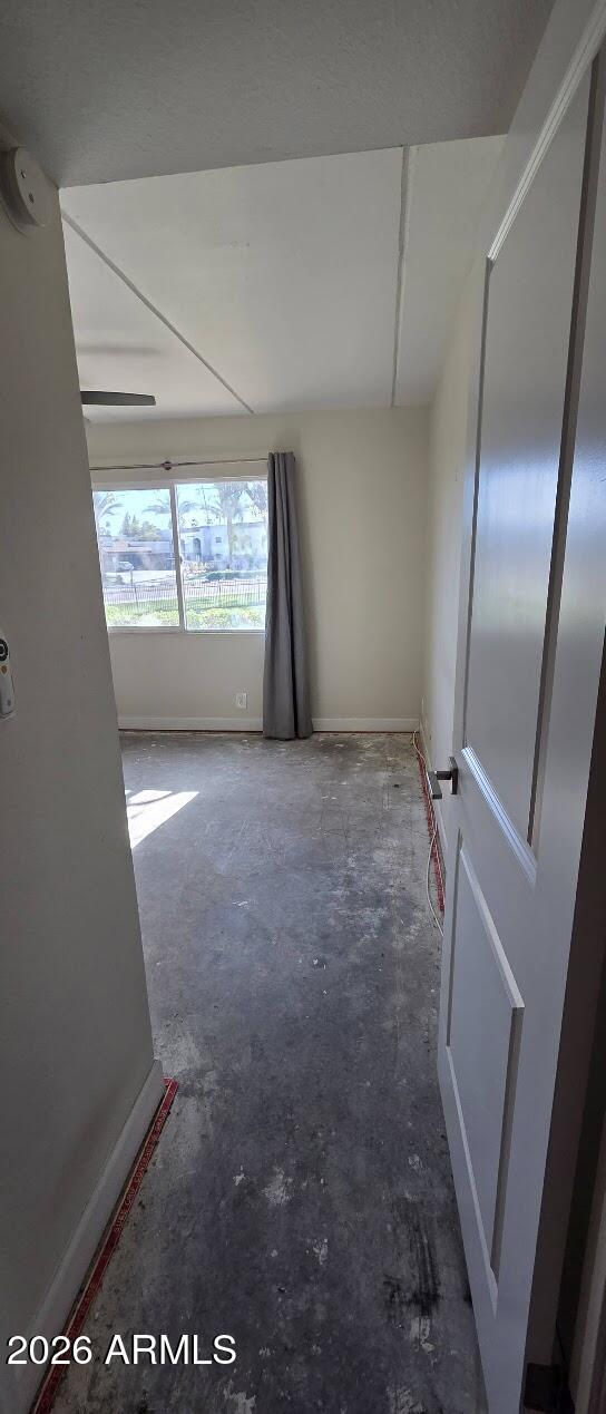 7910 East Camelback Road, Unit 104 Scottsdale, AZ 85251 - Photo 34 of 38 a view of empty room with windows
