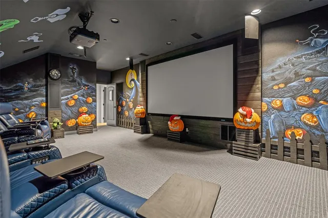 a living room with furniture a rug and white walls