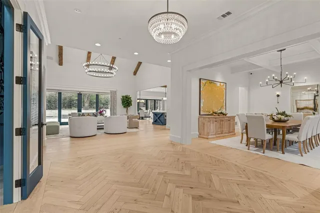 a view of a livingroom with furniture and a table