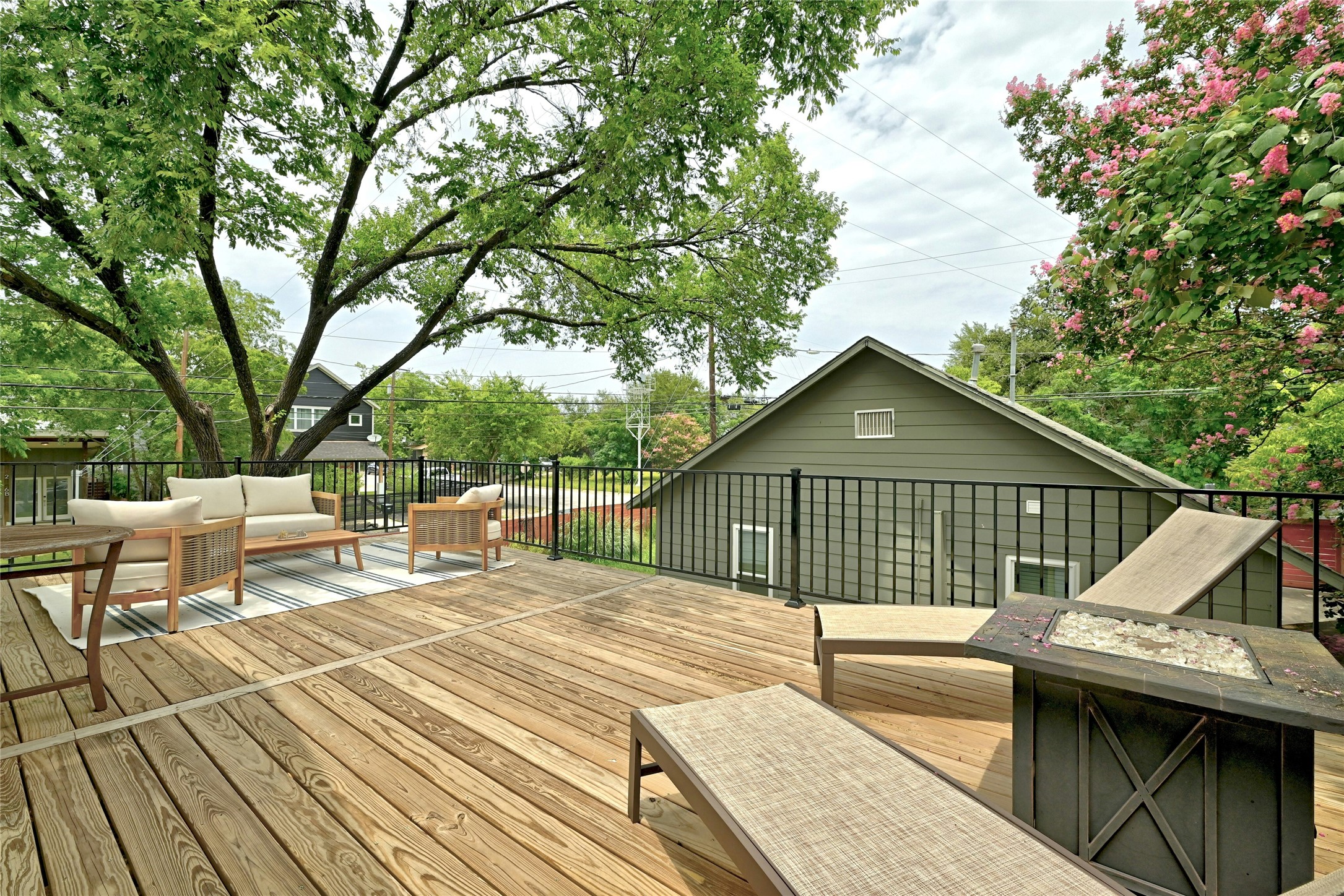 2107 East 13th Street Austin, TX 78702 - Photo 14 of 25 a view of house with a deck and furniture