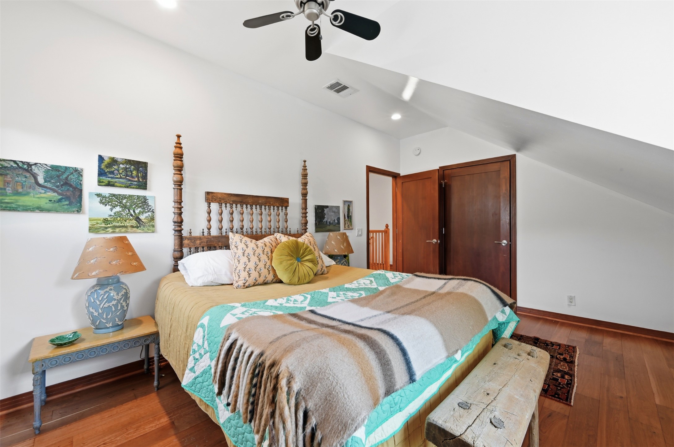 2107 East 13th Street Austin, TX 78702 - Photo 15 of 25 a bedroom with a bed and a chandelier