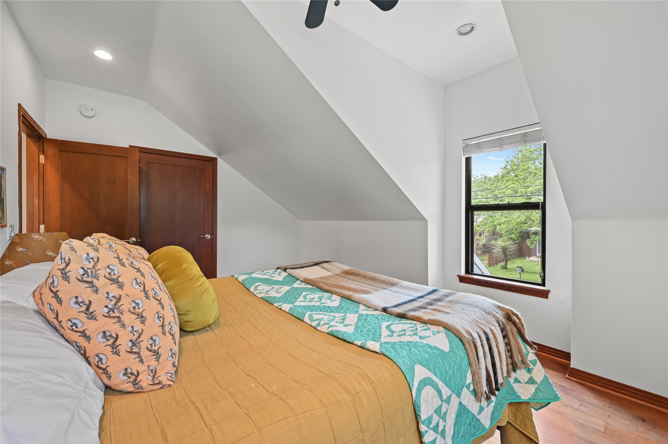 2107 East 13th Street Austin, TX 78702 - Photo 16 of 25 a bedroom with a bed and a window