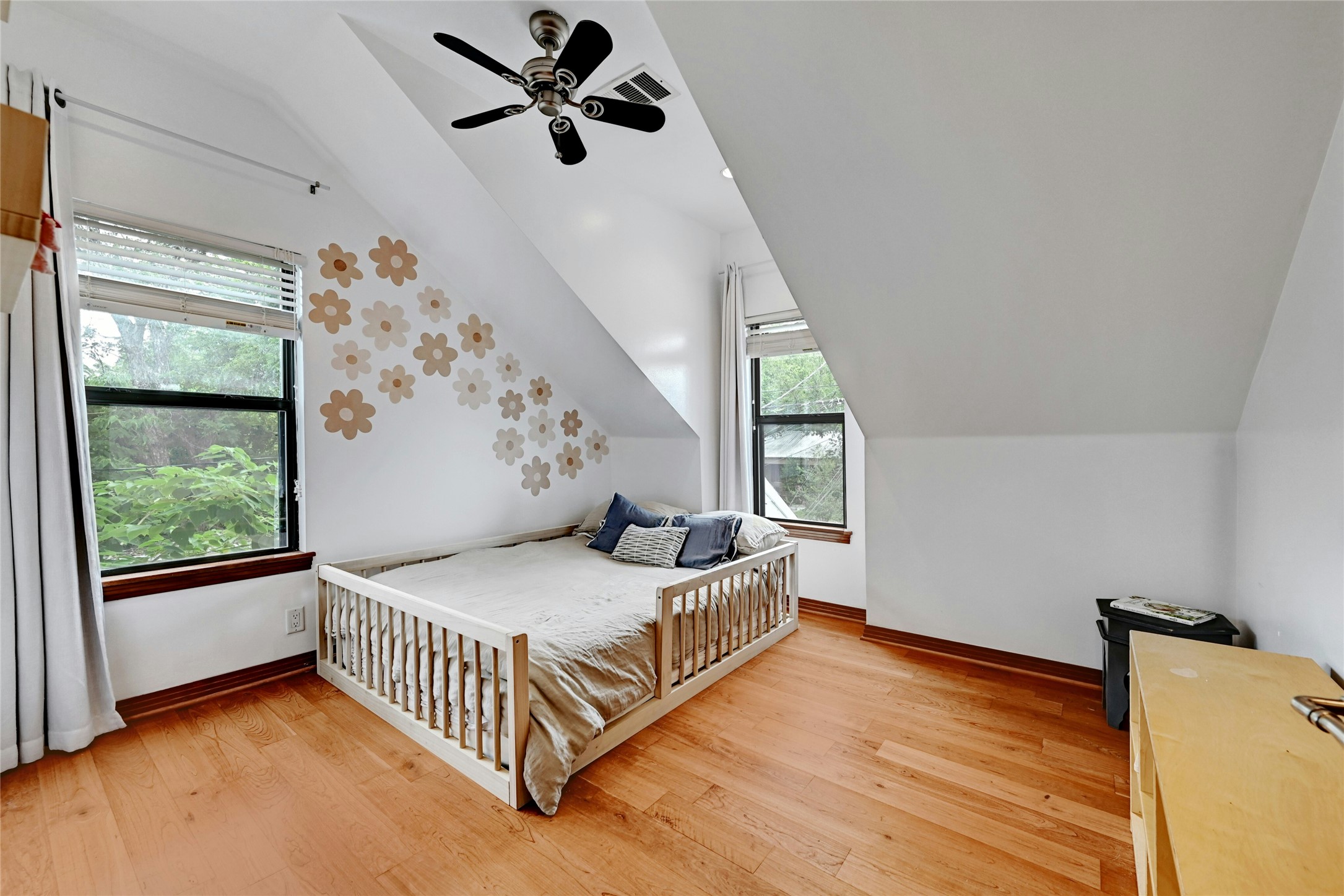 2107 East 13th Street Austin, TX 78702 - Photo 19 of 25 a bedroom with a bed and window