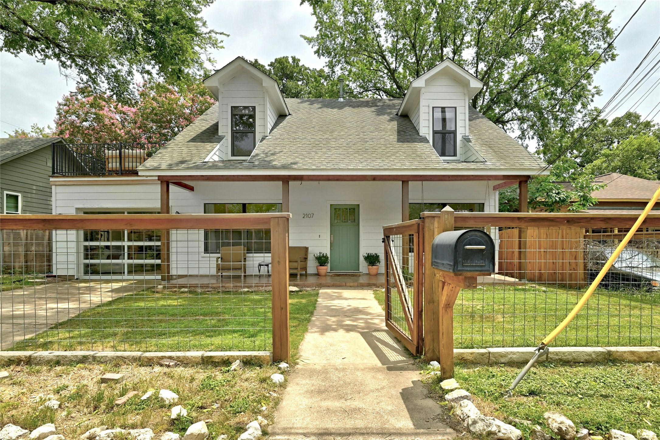 2107 East 13th Street Austin, TX 78702 - Photo 24 of 25 a view of a house with a backyard