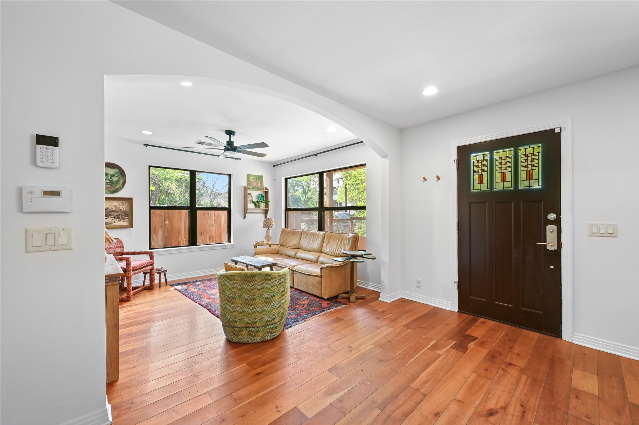 2107 East 13th Street Austin, TX 78702 - Photo 5 of 25 a living room with furniture and large windows