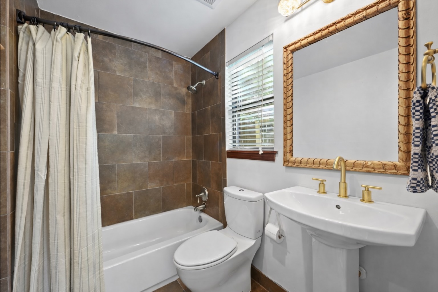 2107 East 13th Street Austin, TX 78702 - Photo 10 of 25 a bathroom with a sink toilet and shower