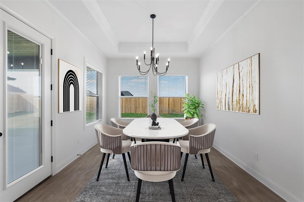 2113 Holborn Street Lorena, TX 76655 - Photo 11 of 31 a view of a dining room with furniture window and wooden floor