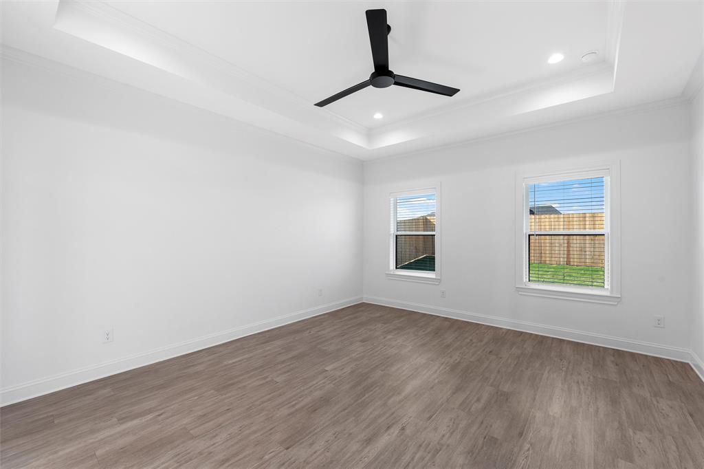 2113 Holborn Street Lorena, TX 76655 - Photo 20 of 31 wooden floor in an empty room with a window